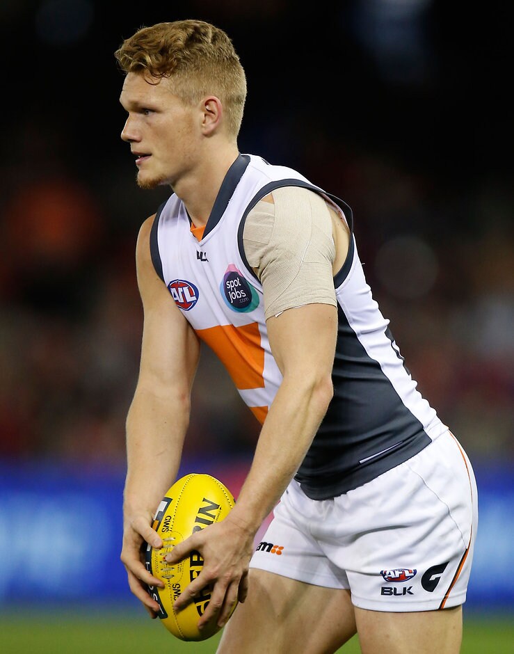 AFL 2015 Rd 23 - Melbourne v GWS Giants MELBOURNE, AUSTRALIA - SEPTEMBER 6: Adam Treloar of the Giants in action during the 2015 AFL round 23 match between the Melbourne Demons and the GWS Giants at Etihad Stadium, Melbourne, Australia on September 6, 2015. (Photo by Michael Willson/AFL Media)